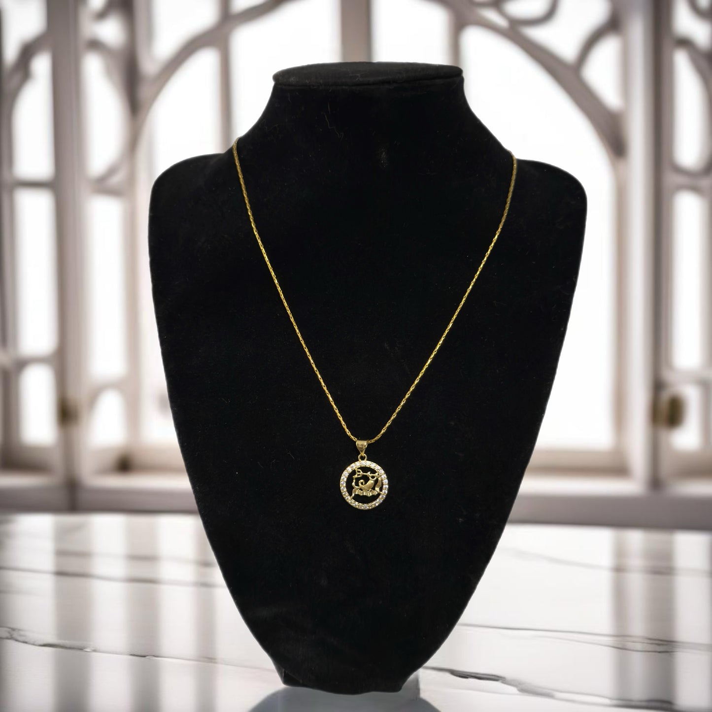 Gold zodiac pendant necklace