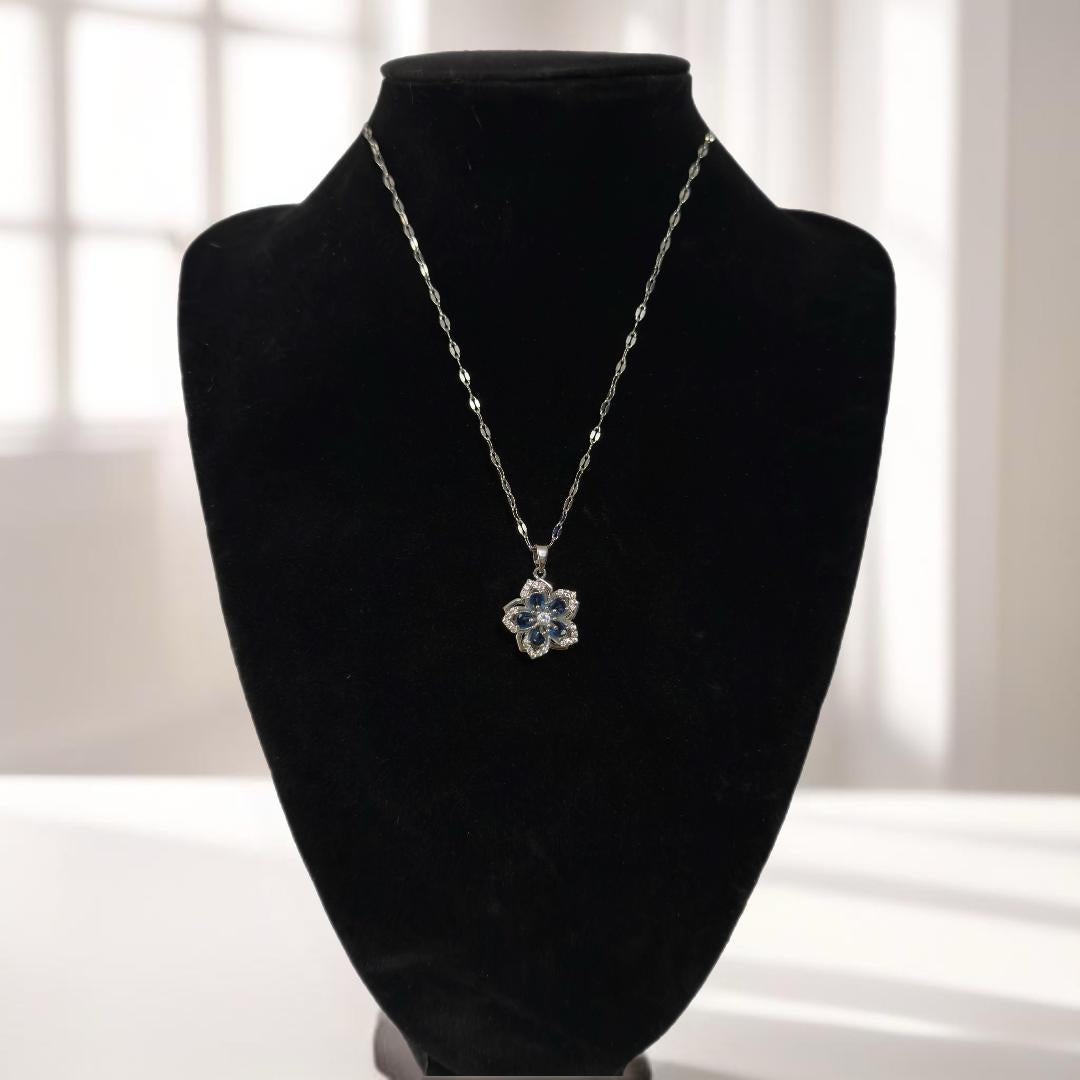 Silver flower pendant necklace.