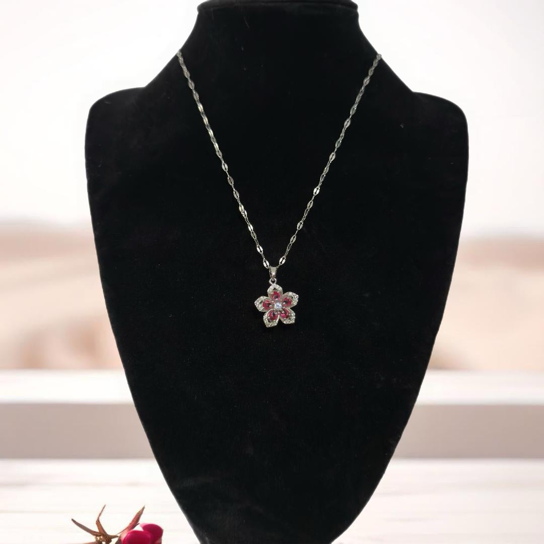 Silver flower pendant necklace.