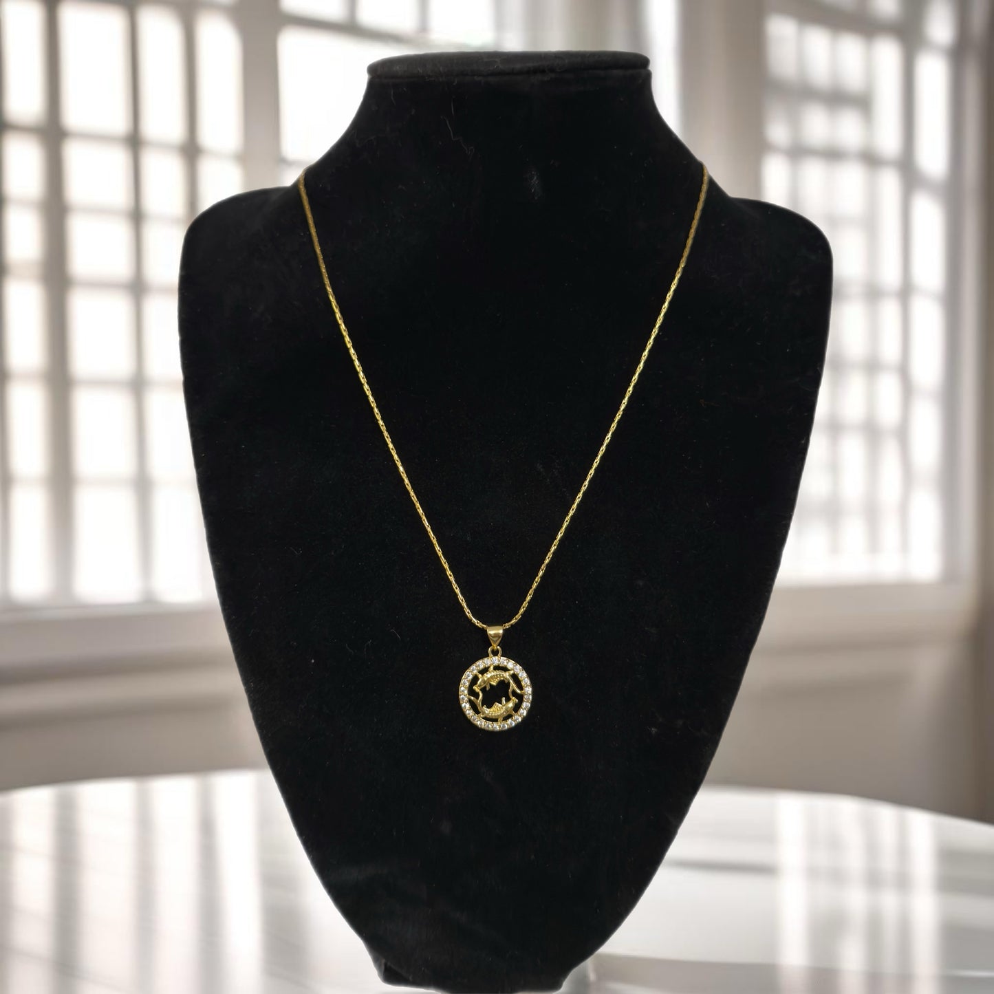 Gold zodiac pendant necklace