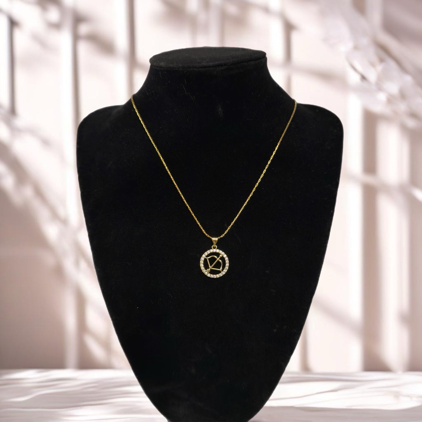 Gold zodiac pendant necklace