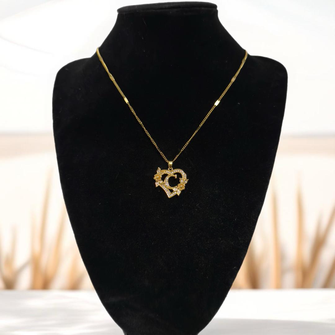 Gold heart initial pendant necklace