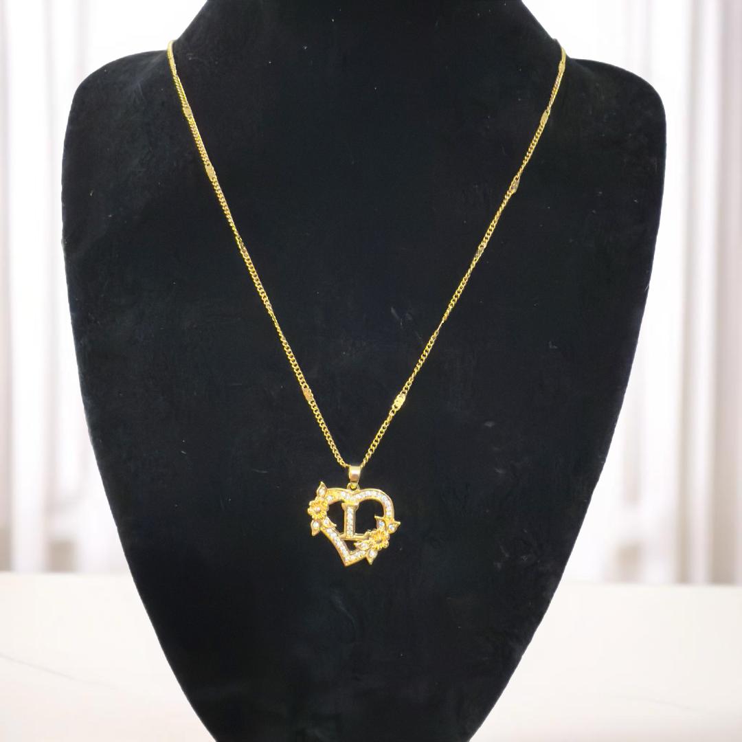 Gold heart initial pendant necklace