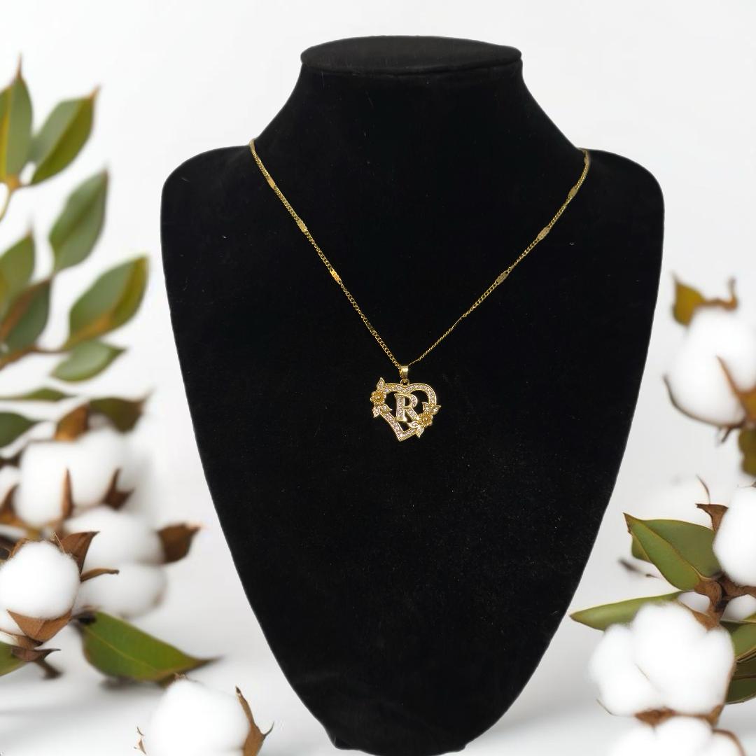 Gold heart initial pendant necklace